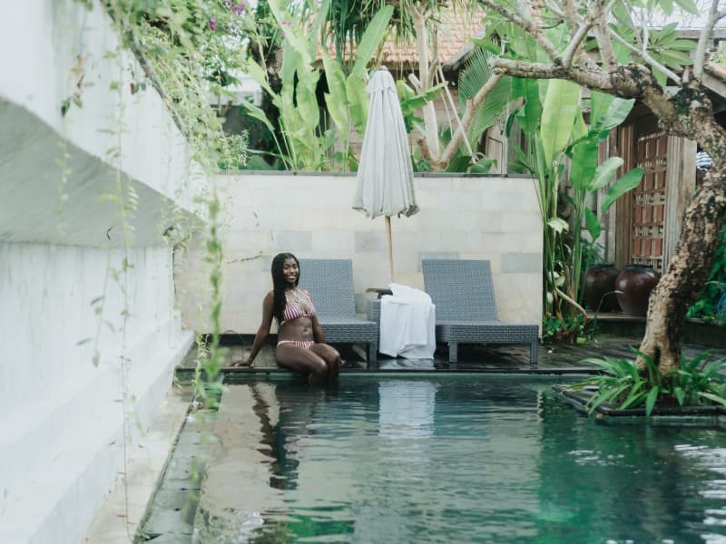 Tranquil Poolside Tropical Garden View with Frangipani Trees at Rimbun Canggu