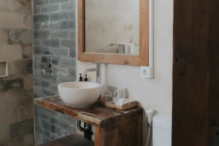 Rustic Tropical En-Suite Bathroom with Hot Water Amenities at Rimbun Villa
