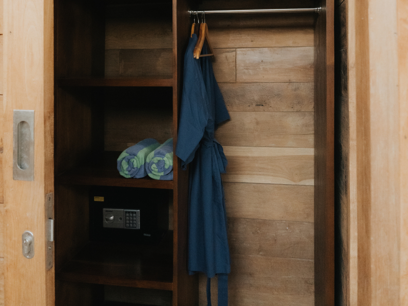 Handcrafted Balinese Teakwood Wardrobe and Storage Amenities at Rimbun Canggu Villa