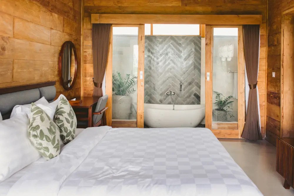Luxury Two-Bedroom Joglo Villa Master Bedroom with King Bed at Rimbun Canggu
